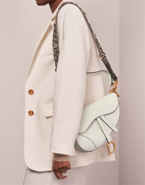 all white dior saddle bag|Dior saddle bag street style.